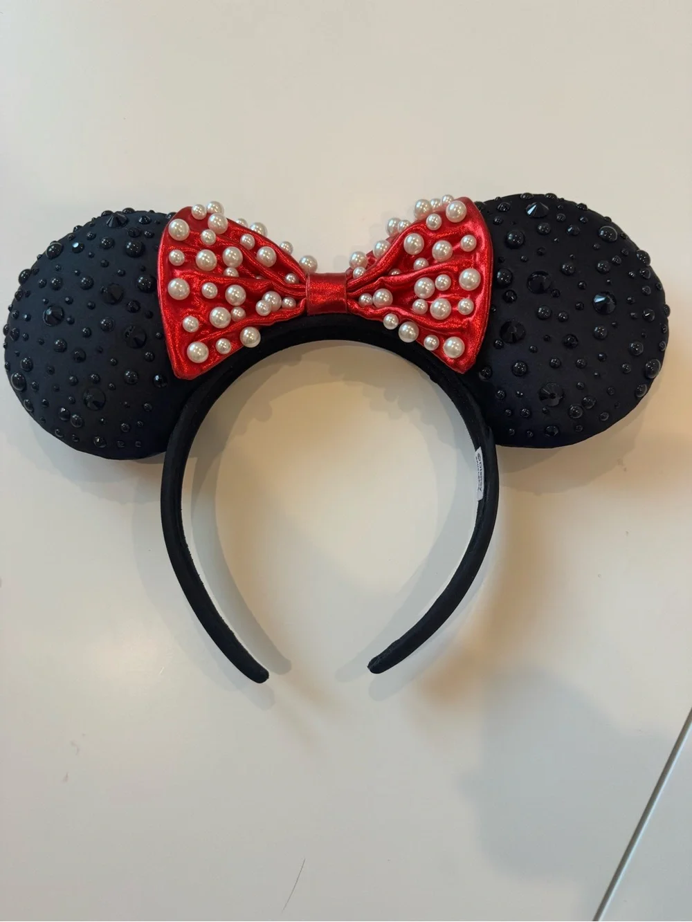 BaubleBar Kids Black Ear Headband with Red Pearl Bow